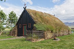 Turf-covered wooden church