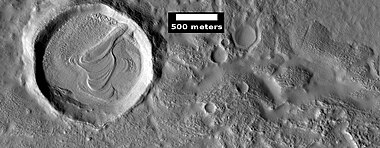 Layered feature in crater, as seen by HiRISE under HiWish program