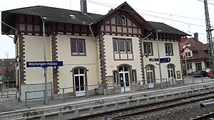 Two-story building with gabled roof