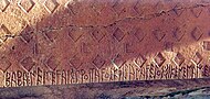 6th century BCE inscription with the Phrygian alphabet from the Midas Tomb, Midas City: ΒΑΒΑ: ΜΕΜΕϜΑΙΣ: ΠΡΟΙΤΑϜΟΣ: ΚΦΙJΑΝΑϜΕJΟΣ: ΣΙΚΕΝΕΜΑΝ: ΕΔΑΕΣ (Baba, memevais, proitavos kziyanaveyos sikeneman edaes; Baba, advisor, leader from Tyana, dedicated this niche).[37][38]