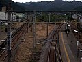 A view of the station platforms and tracks. Note how the platforms form a V-shape because of the converging tracks.