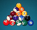 One of many valid racks in the pocket billiards (pool) game of kelly pool; the 1 ball is at the apex of the rack and is on the foot spot, the 2 is in the corner to the racker's right, and the 3 ball in the left corner, with all other balls placed randomly, and all balls touching.