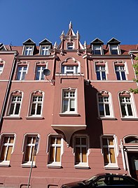 Bay window onto Garbary street, topped with pinnacles