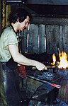 Blacksmith at the fire