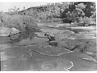 A man washing himself in Palm Valley, 1935