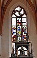 Ostfenster mit Apostel Andreas, der heiligen Veronika, Anna selbdritt, Emblemen und Wappen der Stifterfamilie