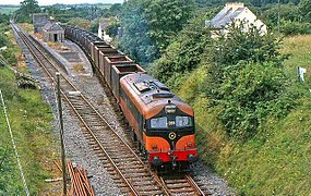 The Asahi liner train passing the closed station at Manulla Junction, 10th August 1985