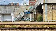 Place name sign on a platform