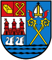 Wappen von Kołobrzeg (Kolberg), im ersten Feld eine Siedepfanne, im zweiten die Pfannhaken