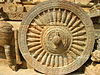 Horse-drawn chariot carved onto the mandapam of Airavatesvarar temple, Darasuram (left). The chariot and its wheel (right)are so finely sculpted that they include even the faintest details