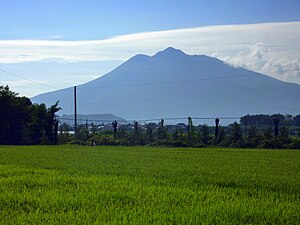 Mount Iwaki stands prominently to the southwest of Tsugaru