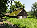 Ein traditionelles Holzhaus in Dębowiec (Baumgarten)