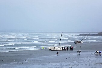 Sailboats broke from their moorings and washed ashore in Massachusetts