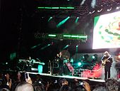 Los Temerarios performing onstage.