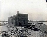 Castings for the number three generator unit before unloading from car at Coon Rapids Dam power plant.