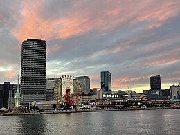 View of MOSAIC and Meriken Park from ferry at dusk (2022)
