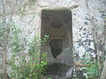 Cava del Rivettazzo, entrance and interior of a tomb.