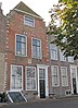 Huis met afgeknotte trapgevel