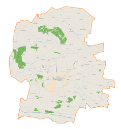 Mapa konturowa gminy Grabów, u góry nieco na prawo znajduje się punkt z opisem „Parafia św. Mateusza Apostoła i św. Rocha”