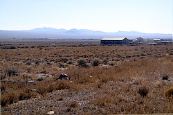 View to the southeast showing Partoun and West Desert High School