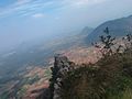 an outcrop of rock jutting to tamilnadu scenery