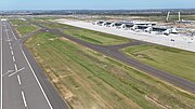 Terminal, runway and surrounding apron in January 2025