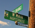 In Fredericksburg, Texas founded by Germans, using German image for tourism. German part of the sign only for a German aura.