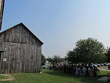 Outdoor image with sun and barn