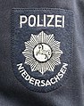 Ärmelabzeichen der alten blau/grauen Uniform bis 1976