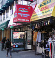 Harlem, 116th Street and Eighth Avenue and the uptown entrance to the B,C train.