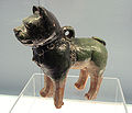 Glazed pottery dog, collar patterned onto the surface; Eastern Han, 1st century CE.