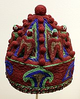 An example of a beaded royal coronet, (Akoro), Indianapolis Museum of Art. The Akoro was usually smaller than an Adé, fringeless and was usually worn by lesser ranking kings, nobles and community leaders under powerful regional Obas.