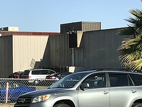 East side (Castle Rock Rd.), showing windowless concrete construction that is typical of the campus