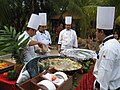 Chefs wearing standard uniform