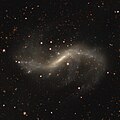 NGC 4731 with legacy surveys