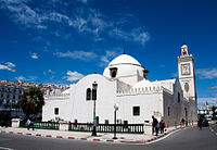 Mosque with a dome and square minaret