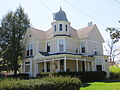 Queen Anne style house with cupola