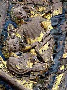 Première représentation connue d’un clavecin, sculpture d’autel provenant de la cathédrale de Minden. L’ange de gauche joue du psaltérion.