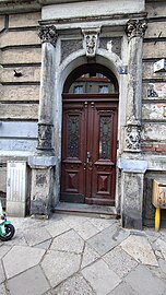 Main entrance door and portal