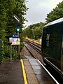 A departing train is signalled onto the line to Ascot in August 2023.