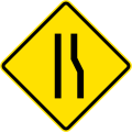 PF-1b Road narrows ahead on right side