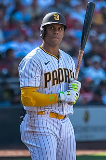 Soto looking off in the distance, wearing a batting helmet