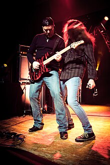 Carroll and Bennett performing in 2013.