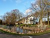 Oldambtster villaboerderij in eclectische stijl (zie ook close-upfoto)