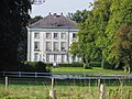 zicht op achterzijde kasteel Grand Noble vanuit Parkbos