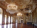 The ballroom again. Although I prefer the other one because of the light interference on this one, here you can see the piano and the golden statues beneath the ceiling.