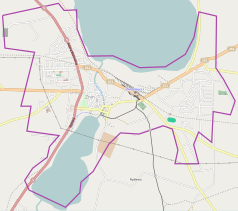 Mapa konturowa Żnina, w centrum znajduje się punkt z opisem „Muzeum Sztuki Sakralnej Sufragania w Żninie”