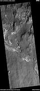 Wide view of light and dark toned layers, as seen by HiRISE under HiWish program