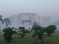 Image 37Jatiyo Sangsad Bhaban is the National Assembly Building of Bangladesh, located in the capital Dhaka. It was created by architect Louis I. Kahn and is one of the largest legislative complexes in the world. It houses all parliamentary activities of Bangladesh. This photo offers a view of the parliament building during sunrise. Photo Credit: Lykantrop