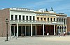 Photograph of the Big Four House in Old Sacramento, with signs "Central Pacific Rail Road Company", "Huntington & Hopkins", and "Hardware".